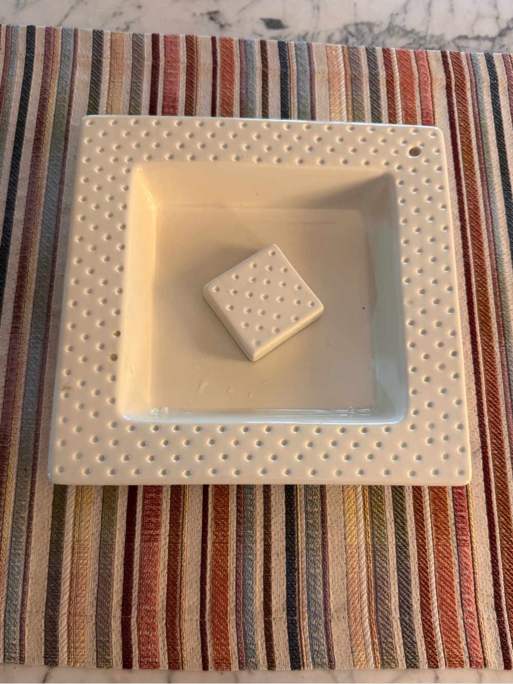 Nora Fleming pearl dot napkin holder, like new, 8 1/2x1 1/2. Retired item